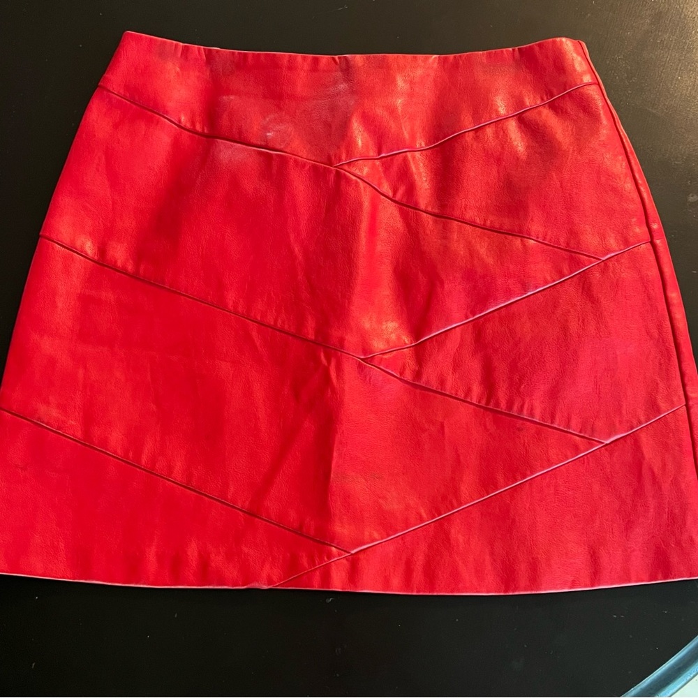 MinkPink red vegan leather mini skirt.